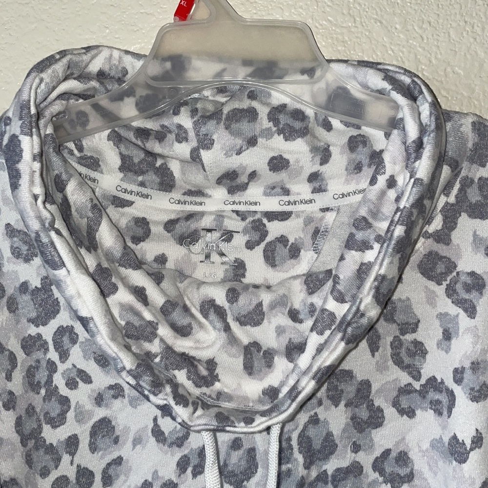 Brand New With Tag women’s Cawl neck knit top by  Calvin Klein size #S